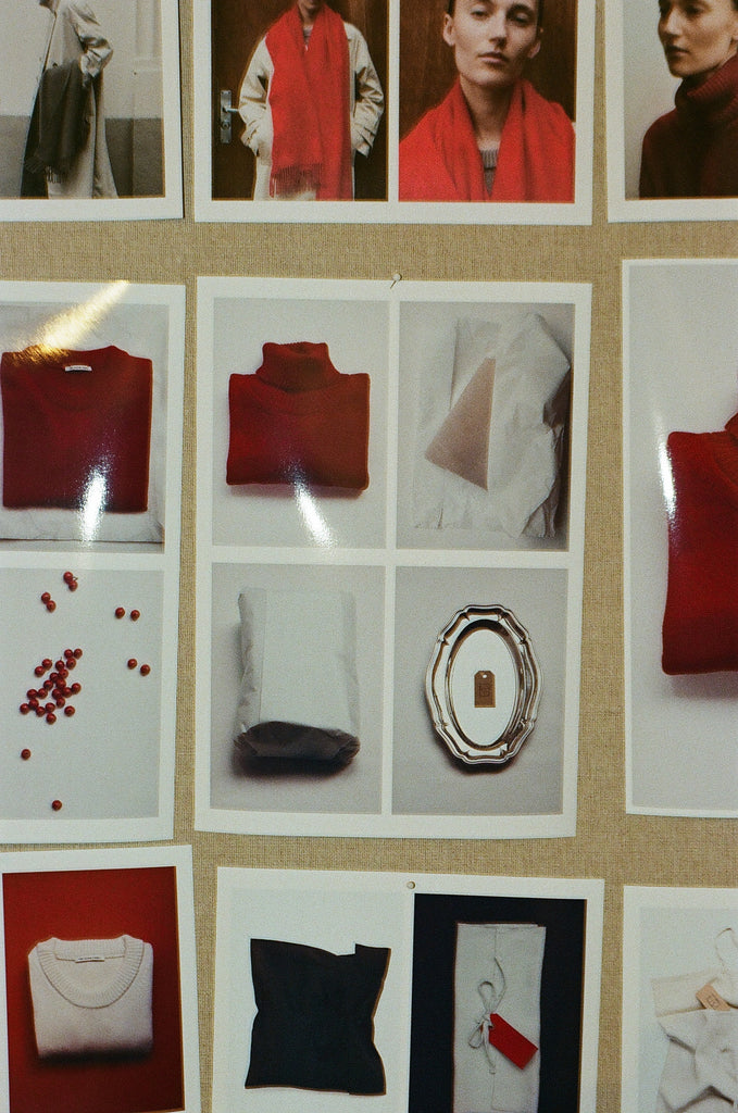 Collage of various clothing items displayed on a wall.